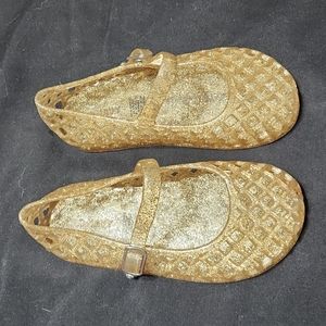Almost new Old Navy jelly shoes/sandals.  Gold glitter